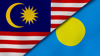 The flags of Malaysia and Palau. News, reportage, business background. 3d illustration