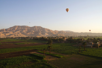 Fototapeta na wymiar Balloon landscapes in Egypt at sunrise