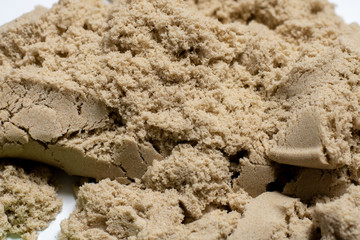Kinetic sand texture closeup. children's creativity