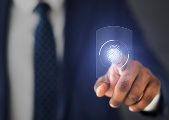 Unrecognizable Businessman Scanning Fingerprint On Virtual Panel For Access, Cropped
