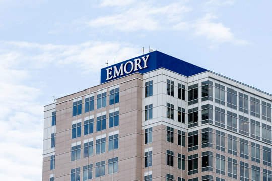 Atlanta, Georgia, USA - January 16, 2020: Emory Sign At Top Of The Winship Cancer Institute Tower In Atlanta, Georgia. Winship Cancer Institute Of Is A Nonprofit Cancer Research And Patient Care Cente