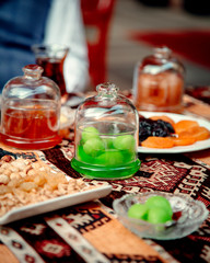 kiwi jam and dried fruits on the table