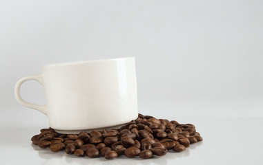 cup of coffee with beans