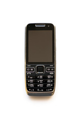 Old cell phone on the white background