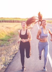 Women exercise happily for good health. Exercise concept