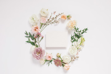 Elegant floral composition with paper blank in the centre. Branding mock up concept.