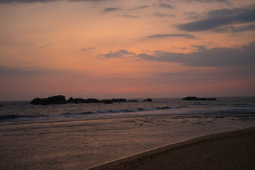 sunset on the coast of the indian ocean