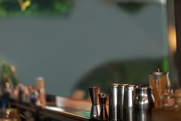 Close up view on wooden bar counter, blurred background