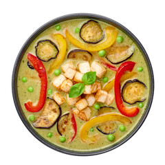 Vegetarian Thai Green Curry with tofu in black bowl isolated on white background. Veg Green Thai Curry is thailand cuisine dish with green chillies paste, basil, spices and vegetables. Isolate