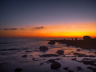 Fototapeta na wymiar Sunrise on the Sitapur beach in Neil Island, Andaman, India, with dramatic sky at twilight
