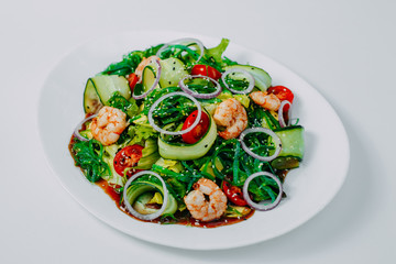 fresh vegetable salad with shrimp, healthy eating isolated on white background