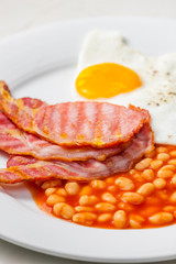 English breakfast with bacon beans and egg