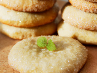 Sugar cookies on a wooden background. Appetizing homemade cakes.