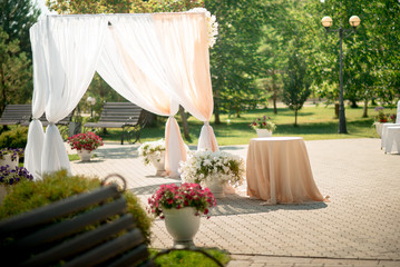 Wedding registration arch decorated with flowers
