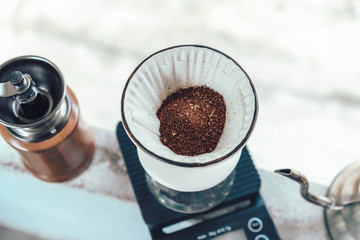 Ground coffee beans drip coffee, making drip coffee. Top view and , background