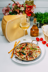 cheese casserole with vegetables, on a white background