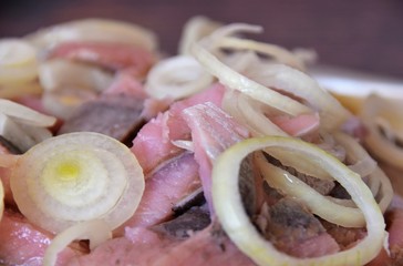 herring fillet with onion, closeup
