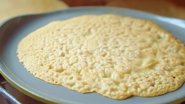 Flapjack, tortilla, pizza, bake fry pancake in pan. Yummy texture. Close up.