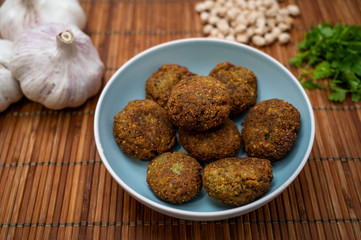 Handmade falafel cooked with chickpeas, parsley and garlic, Middle Eastern dish