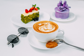 cup of cappuccino with a pattern, coffee on a white background