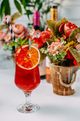 Beautifully decorated cocktail with a straw