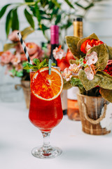 Beautifully decorated cocktail with a straw