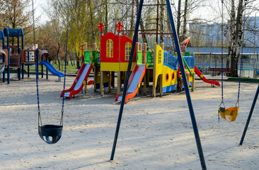 An empty playground, which is forbidden to visit during the quarantine period of the pandemic of COVID-19 disease caused by coronavirus