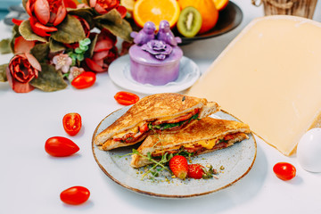 triangular meat and tomato sandwiches