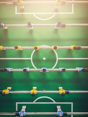Table soccer game. Close-up. Top view. Toning. Mobile photography. Vertical shot for social networks.