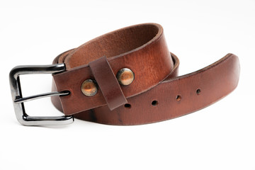 A formal studio product shot of a men’s used brown leather belt with patina set on plain white background.