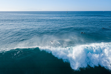 surfer waiting for the next ride on the big wave