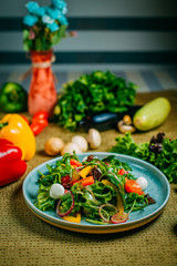 fresh vegetable salad, healthy food on a decorated table