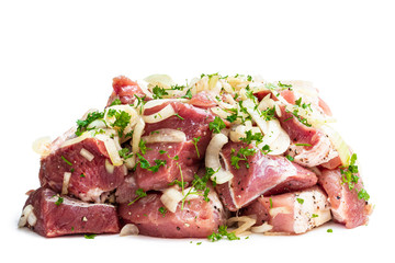 Marinated pork slices with onion and spices isolated on white
