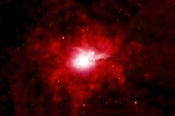 Fototapeta na wymiar Beautiful red galaxy. With land on the horizon. Elements of this image were furnished by NASA.