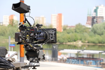 professional film camera, television production, film set, outside