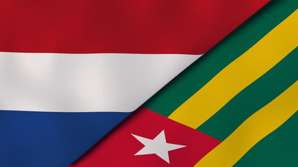 The flags of Netherlands and Togo. News, reportage, business background. 3d illustration