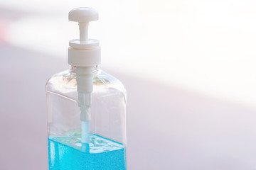 Antiseptic hand gel or alcohol gel prevent the spread of germs and bacteria and avoid infections corona virus,covid-19 prevention for serving customers in the gas station.