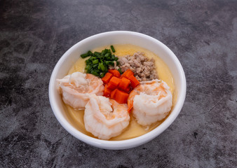 homemade steamed egg with minced pork,carrot,shrimp and vegetable