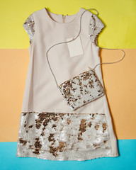 white dress and handbag with shiny beads