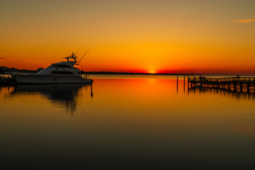 Fototapeta na wymiar Sunset over Choctawhatchee Bay, Village of Baytowne Wharf, Sandestin, Florida