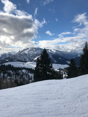 Fototapeta na wymiar Snowy mountain landscape of ski slope