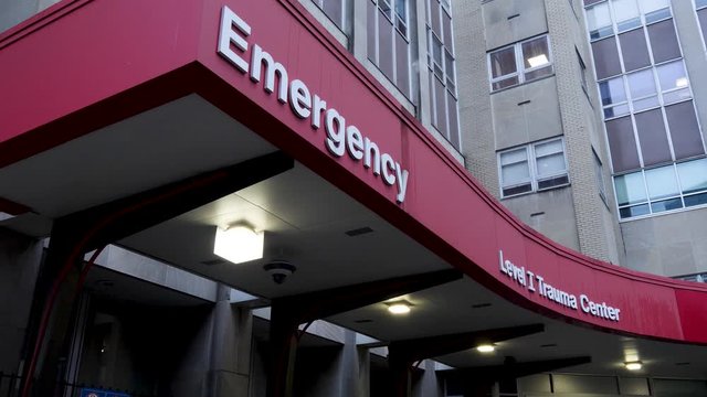 Emergency and Level I Trauma Center sign on hospital