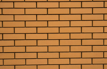 Brick wall texture. Yellow decorative brick.