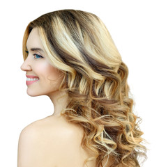 Beauty portrait of blonde woman with wavy hair.