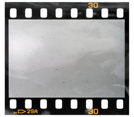 35mm film strip with empty frame cell or window and shiny light effect.