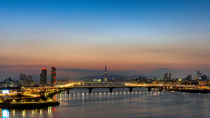 Twilight and cityscape of Seoul,Hangang river and Lotte tower best landmark in Seoul,South Korea