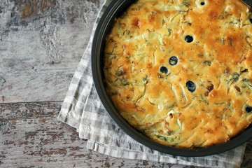 Selective focus. Hot cake in a baking dish. Cooking at home. Healthy fresh homemade cakes.