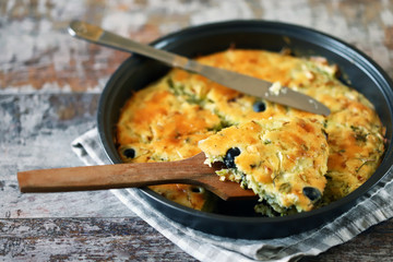 Selective focus. Hot cake in a baking dish. Cooking at home. Healthy fresh homemade cakes.