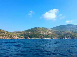 road, highway, sky, asphalt, landscape, travel, blue, way, clouds, car, rural, nature, street, field, country, horizon, green, freeway, line, traffic, drive, cloud, route, grass, transportation, sunse