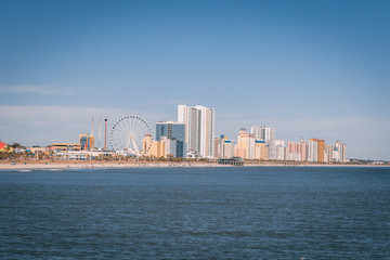 skyline of myrtle beach viewed from dock